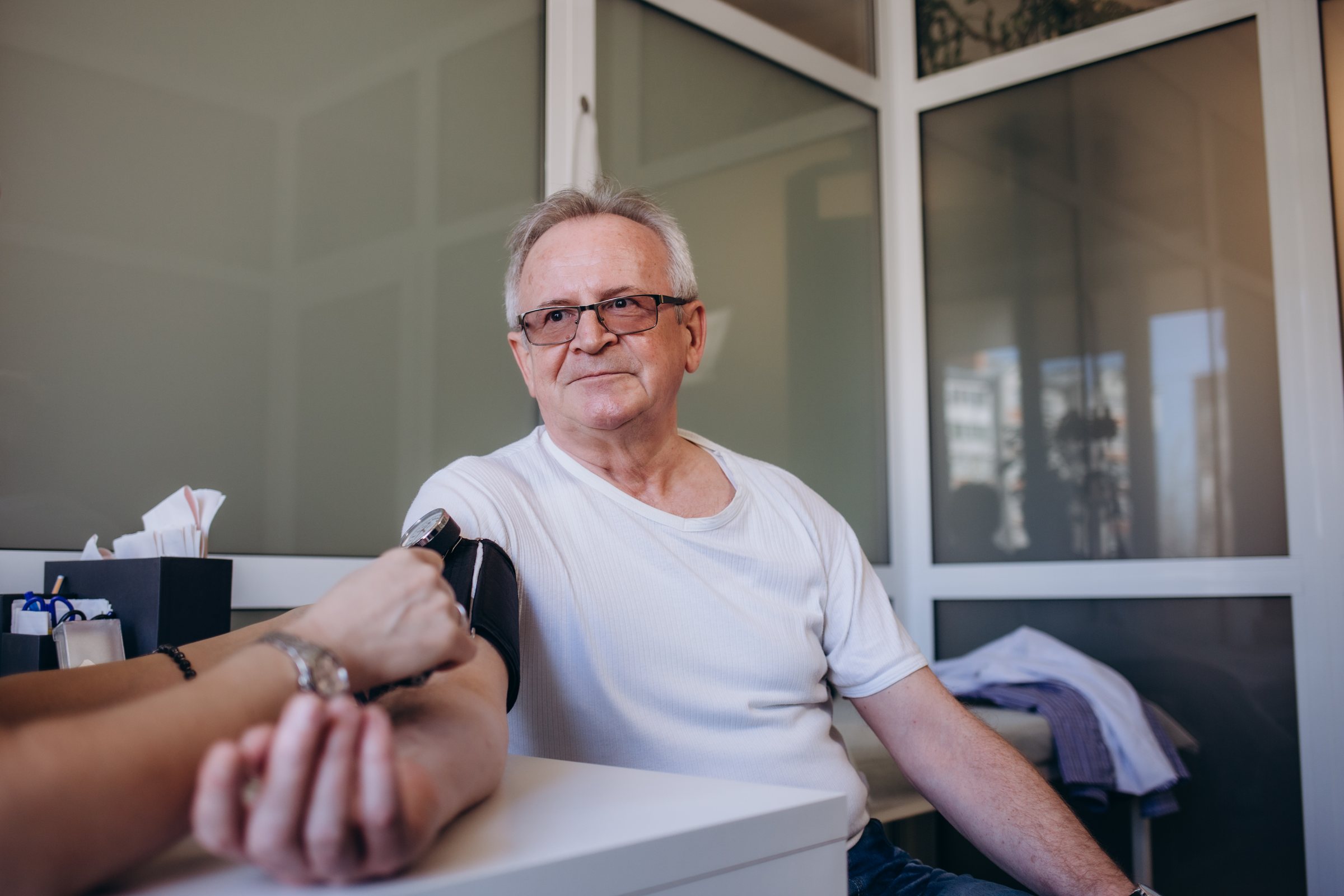 A mature man having a routine health screening